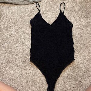 Women’s black lace bodysuit